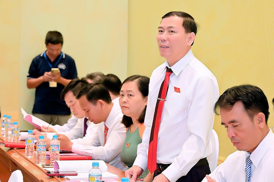 Đại biểu Bùi Văn Khánh-Bí thư Đảng ủy phường An Bình quan tâm đến chỉ tiêu thu nhập bình quân đầu người trong nhiệm kỳ mới. Ảnh: Đức Thụy buivankhanh.jpg